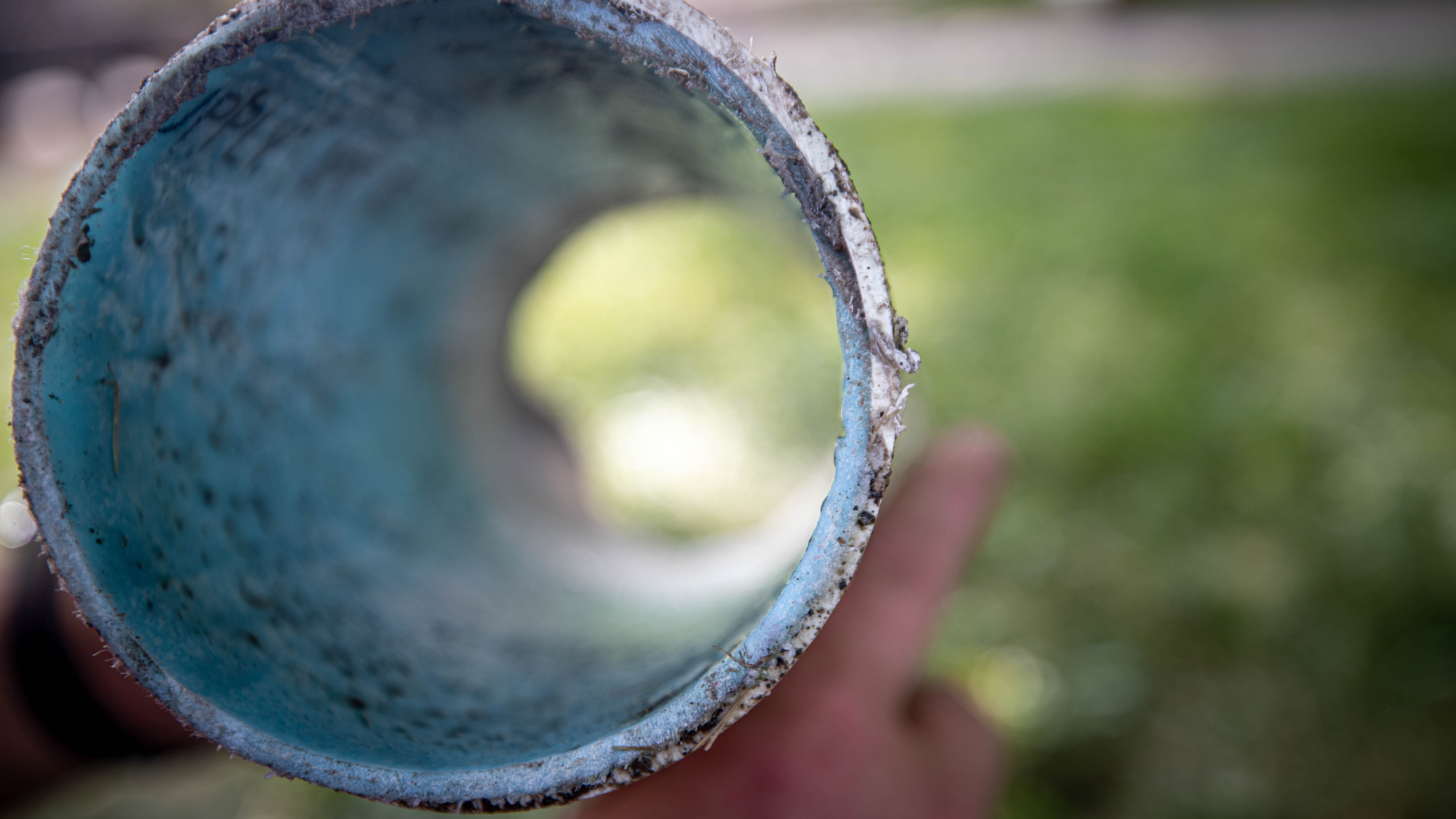 Close-up of a sewer line during a plumbing repair job